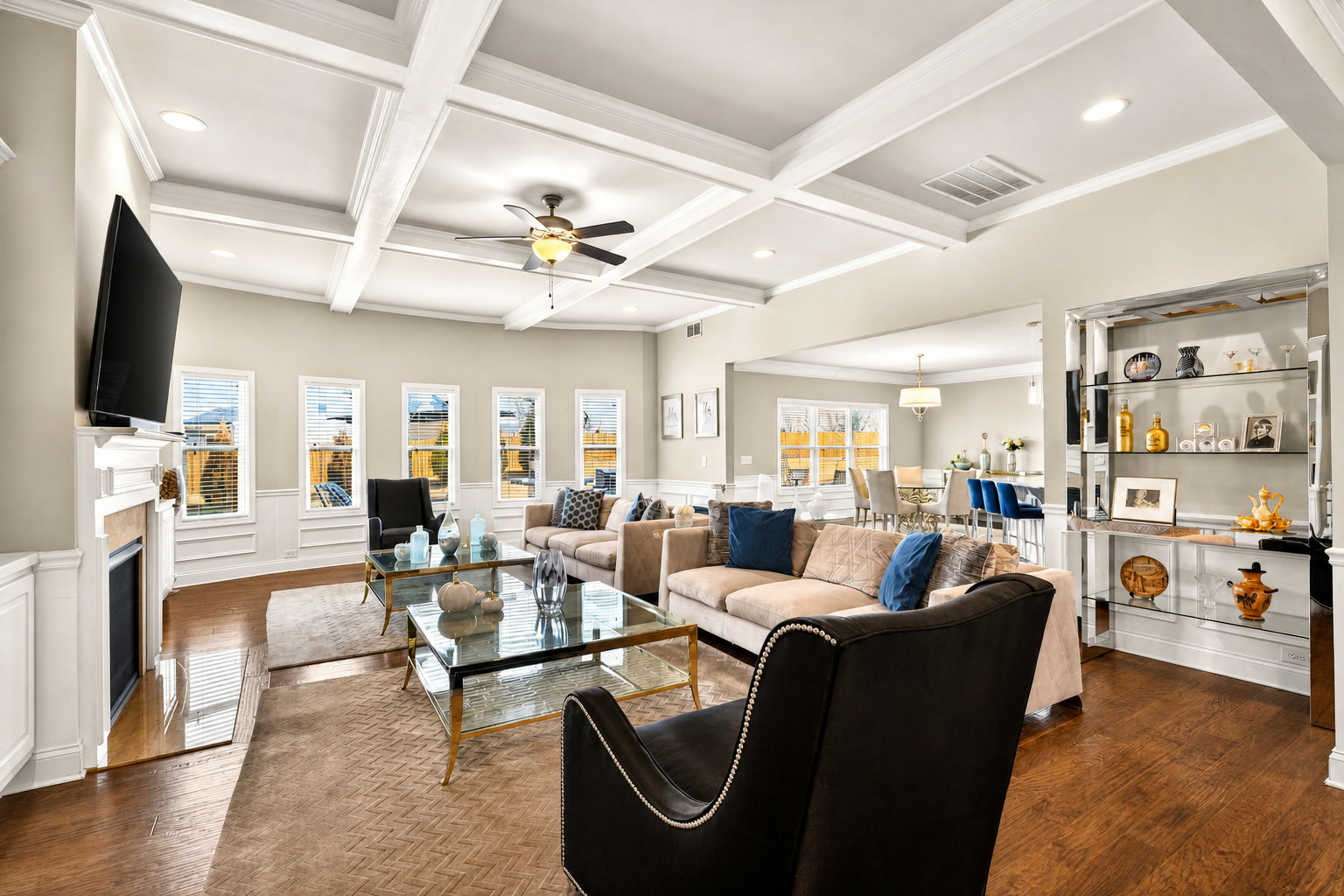 Bright staged living room with large windows