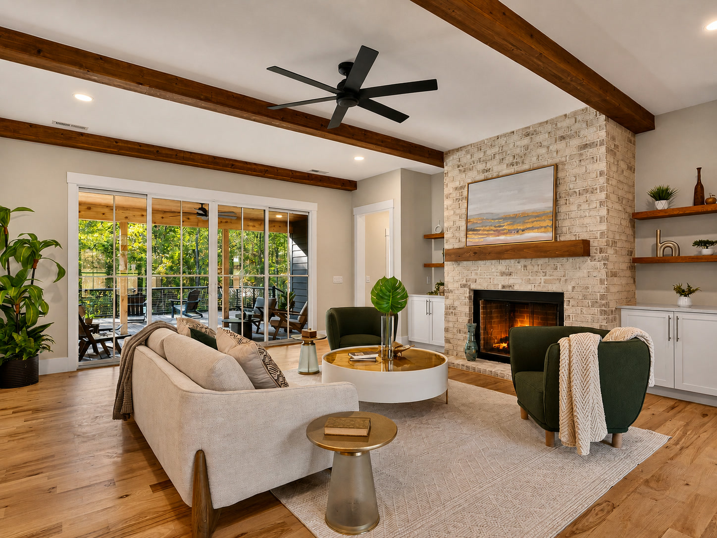 Great room with beamed ceiling and brick fireplace